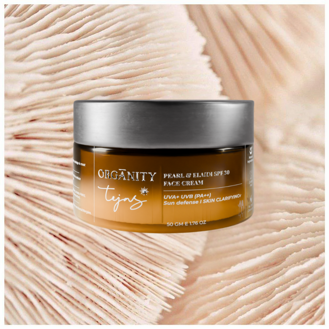 Jar of Organity Tejas Pearl &amp; Elate SPF 30 Face Cream on a textured beige background