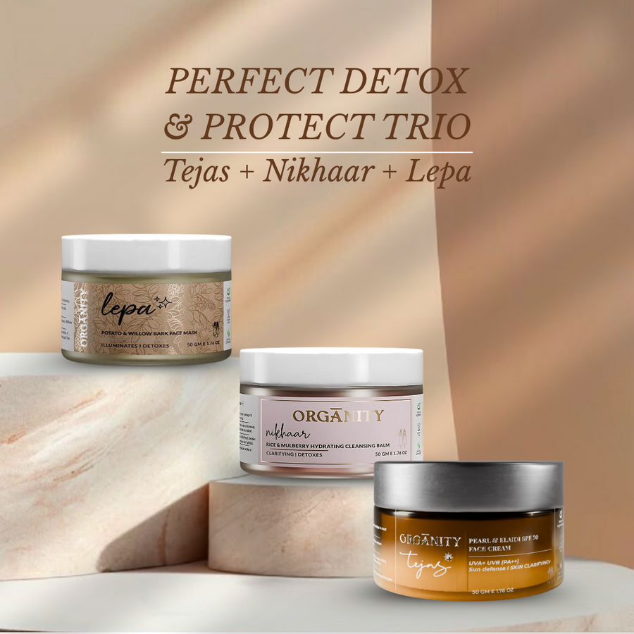 Three skincare jars labeled 'Tejas', 'Nikhaar', and 'Lepa' on a wooden surface with a soft brown background.